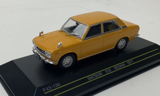 First43 1:43 Datsun 510 Sedan 1971 donkergeel