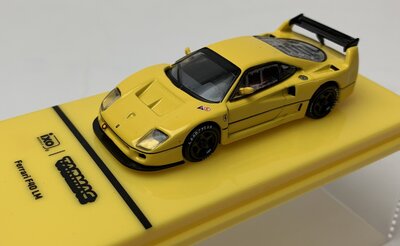 Tarmac 1:64 Ferrari F40 LM geel 