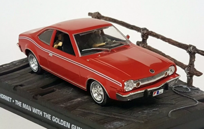 Atlas 1:43 James Bond 007  AMC Hornet *The Man with The Golden Gun*, red, Diorama