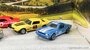 Hot Wheels 1:64 Premium Set no 5 "Going to the Races ", set modellen met Dodge Challenger & Ford Mustang & Chevrolet Camaro & Retro Rig Flatbed Truck_