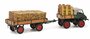 Schuco 1:43 Mercedes Benz Unimog 401 + aanhanger en hout belading_